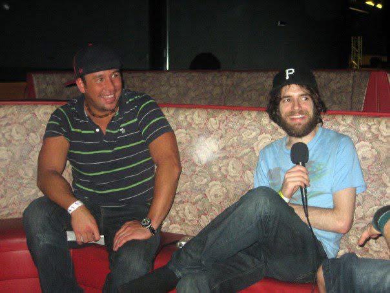 Gregg Gillis of Girl Talk holding the mic next to Moe Train at the Feed the Animals Tour Kickoff Party in Philadelphia