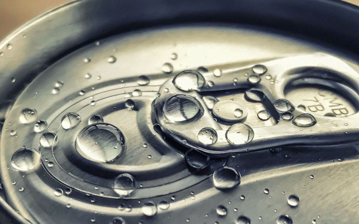 Chilled cans of sparkling water, the format Bubly dressed up for Halloween
