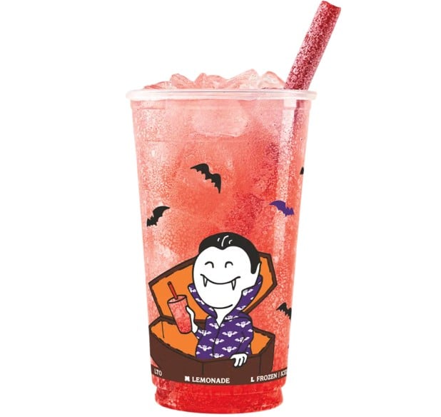 Burger King's Vampire's Bite Strawberry and Sprite in its Halloween cup with a cartoon vampire, bats, and the red Sour Punch candy straw