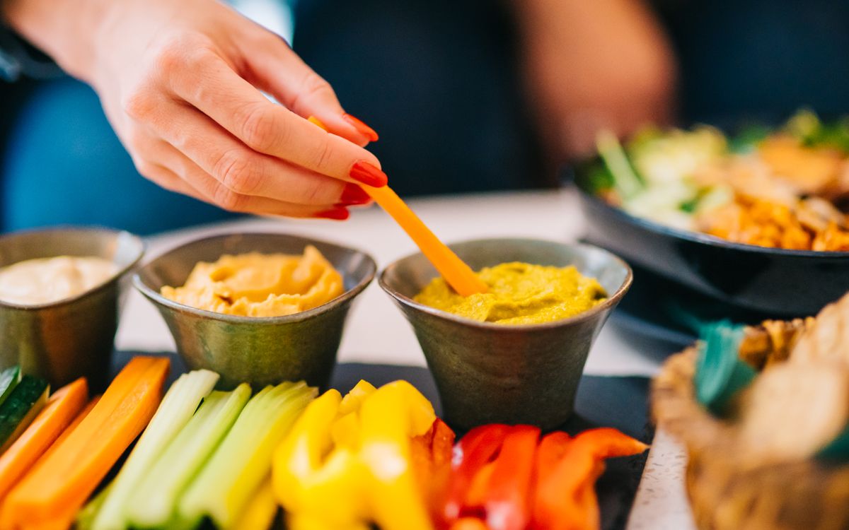 A vegetable platter with ranch dip, the snack table Hidden Valley's black Spooky Ranch was built for