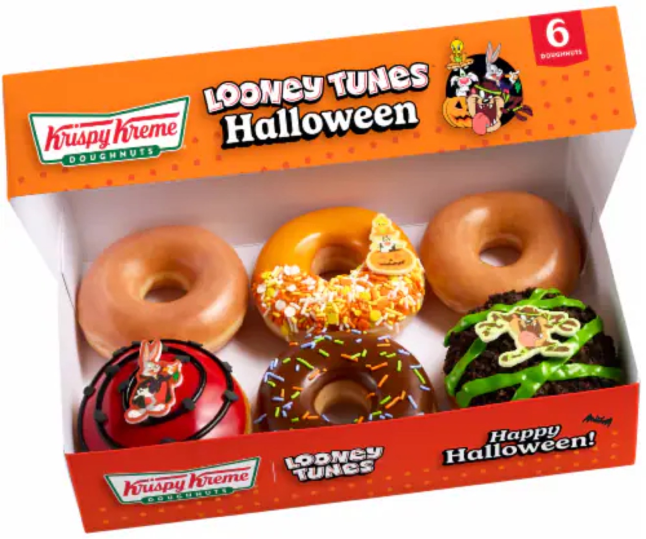 An open Krispy Kreme Looney Tunes Halloween box with six doughnuts: glazed rings, a sprinkle doughnut with a Tweety pumpkin topper, a red Bugs Bunny doughnut, a chocolate sprinkle doughnut, and a Taz doughnut with green icing stripes