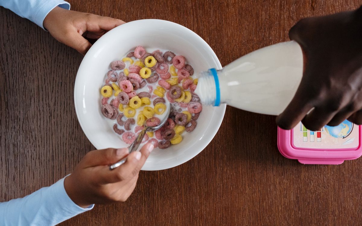 A bowl of colorful fruity cereal, the Nice List side of the Pebbles holiday drop