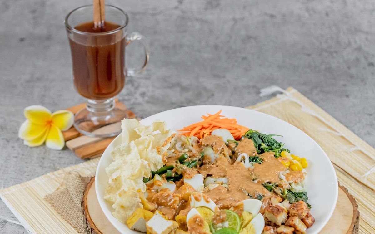 Gado gado vegetable salad covered in peanut sauce